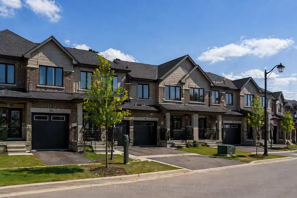 Modern row of townhomes in an Orléans, Ontario residential neighborhood