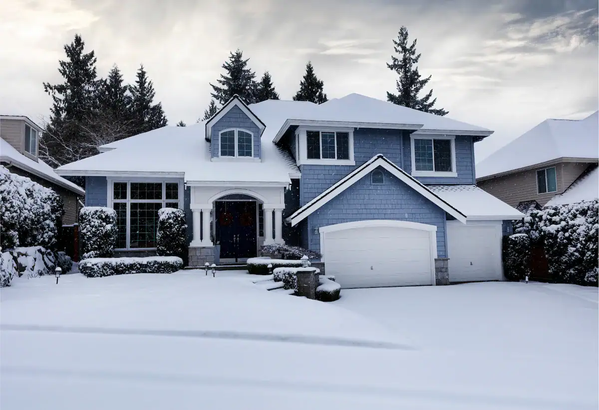 Snow-covered two-storey home in Ottawa during winter