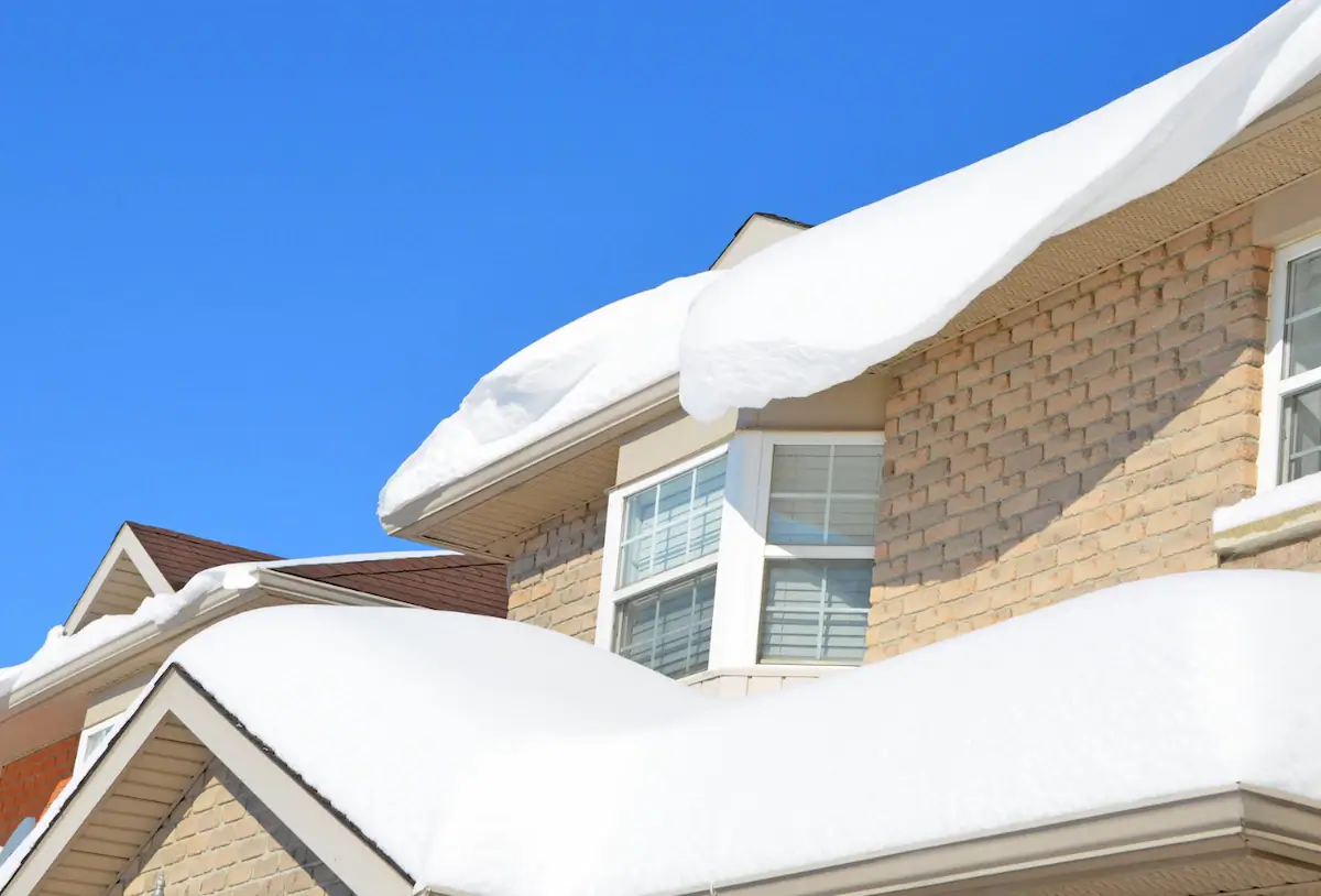 Snow-covered roof on an Ottawa home during winter
